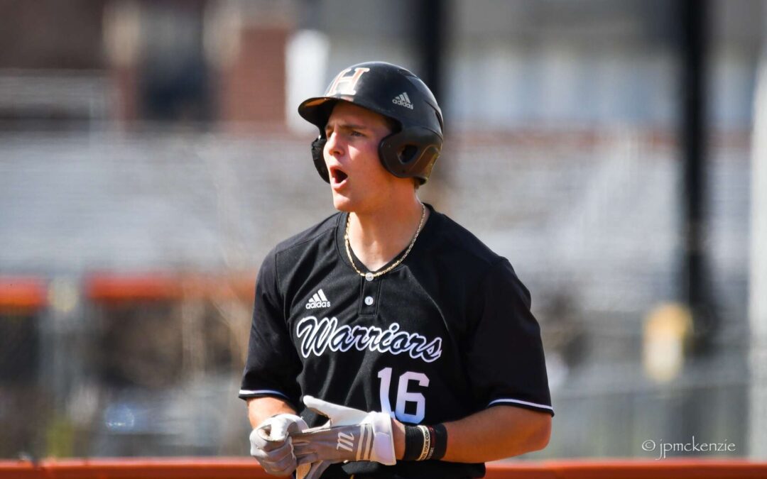 a baseball player with his mouth open